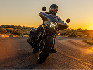 A rider on a Honda motorcycle/Un cavalier sur une moto Honda
